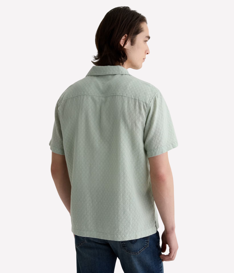 Light green short sleeve camp collar shirt made from lightweight cotton-linen blend with subtle dobby texture and chest pocket – the perfect refined summer shirt.