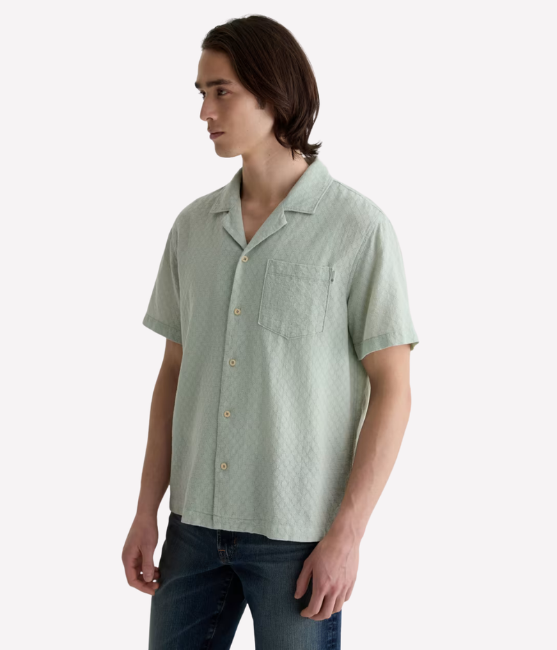 Light green short sleeve camp collar shirt made from lightweight cotton-linen blend with subtle dobby texture and chest pocket – the perfect refined summer shirt.