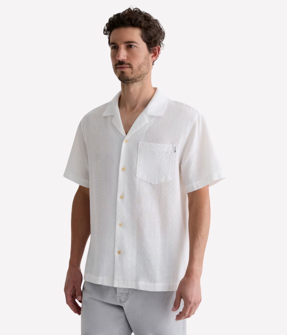 White short sleeve camp collar shirt made from lightweight cotton-linen blend with subtle dobby texture and chest pocket – the perfect refined summer shirt.