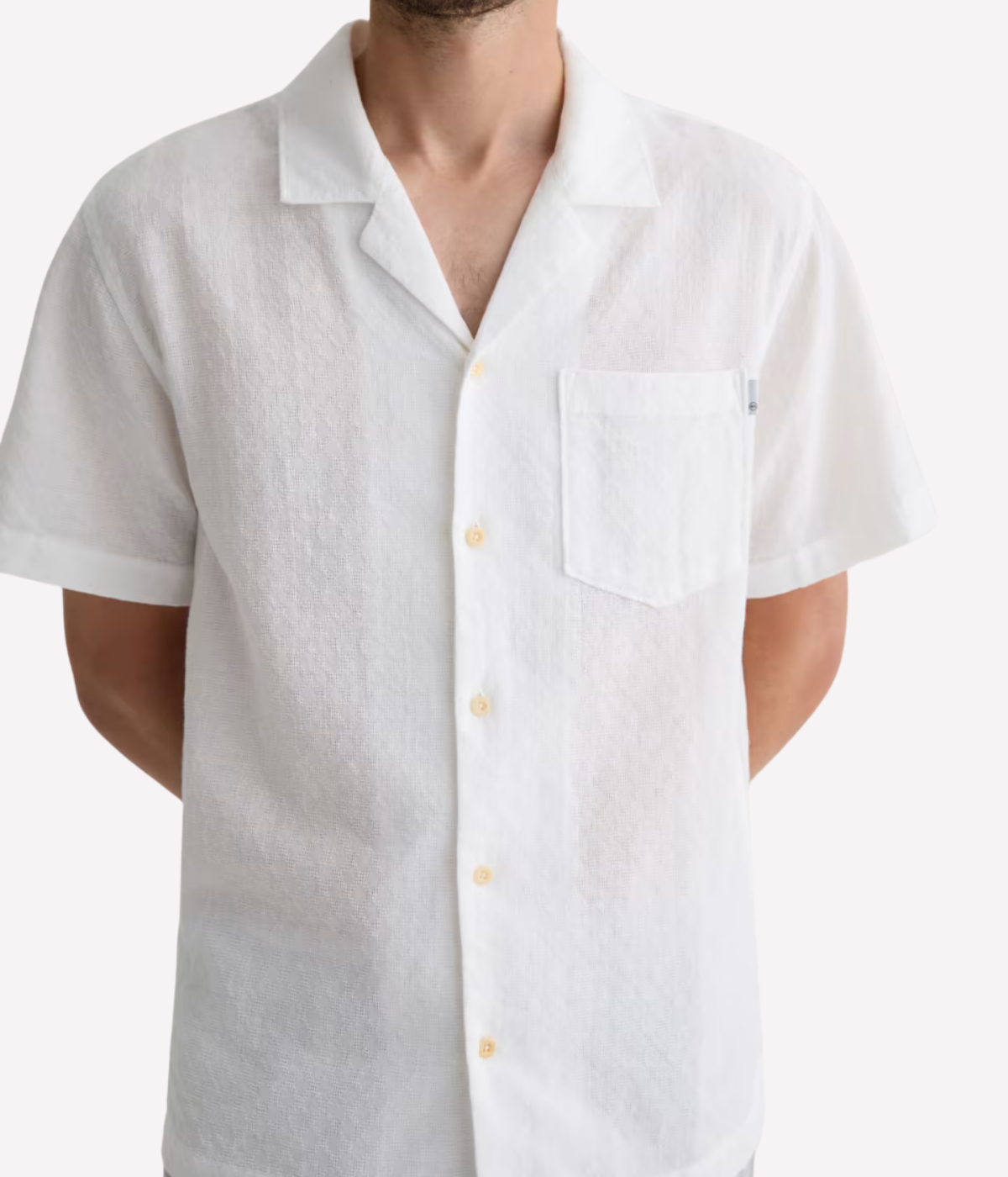 White short sleeve camp collar shirt made from lightweight cotton-linen blend with subtle dobby texture and chest pocket – the perfect refined summer shirt.