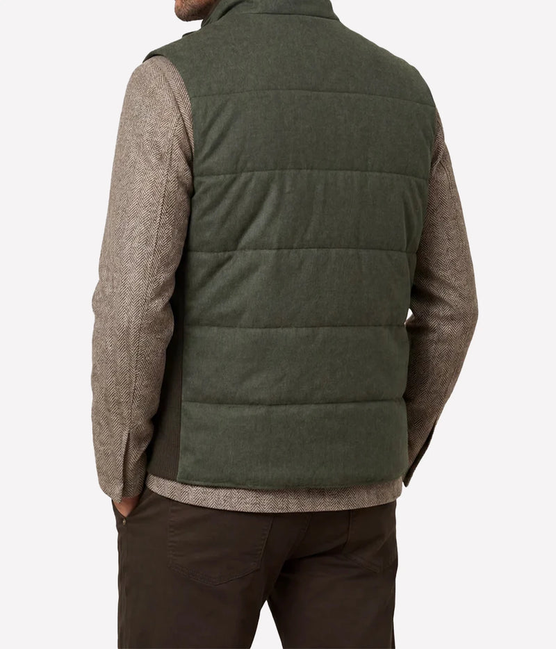 Back view of model wearing Maurizio Baldassari Arena Quilted Wool Vest in Dark Olive