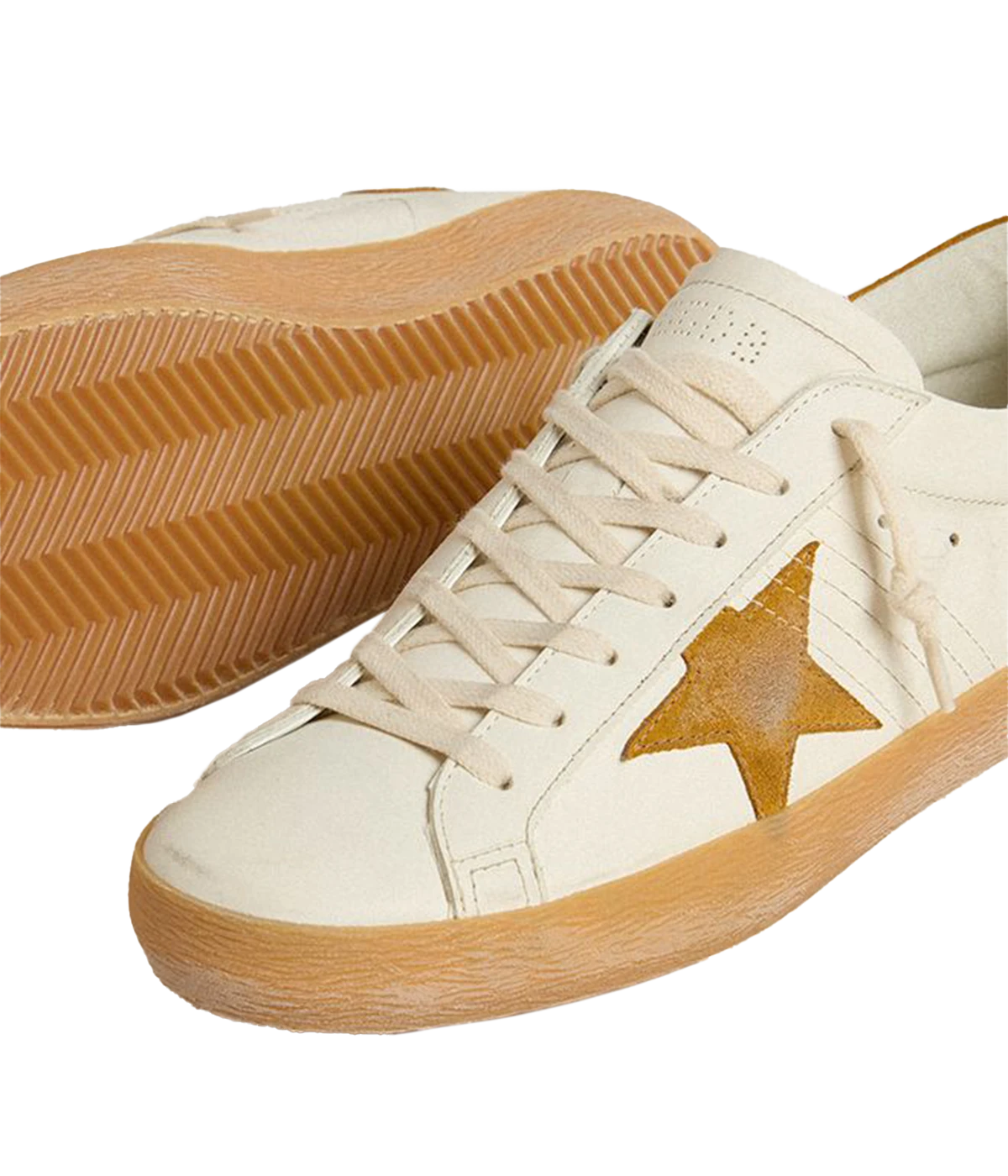 Golden Goose Superstar sneakers with white leather upper, tan suede star and heel tab, and retro-inspired gum sole. Made in Italy.