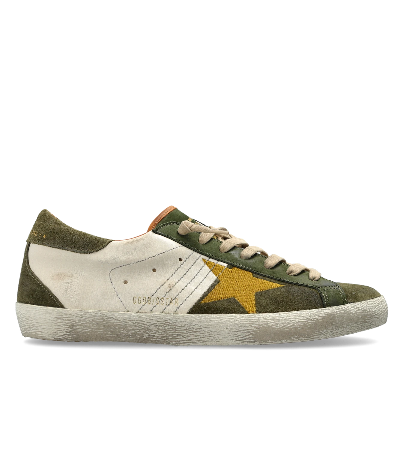 A low-top sneaker featuring an olive green suede and canvas upper, a cream leather side panel, a prominent yellow star on the side, and a thick cream rubber sole.