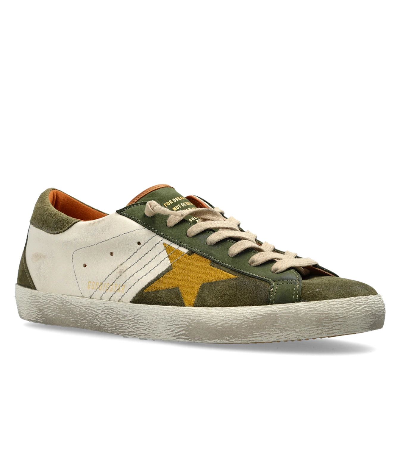 A low-top sneaker featuring distressed olive green suede, off-white leather panels, a prominent gold star on the side, and beige laces, shown against a plain white background.