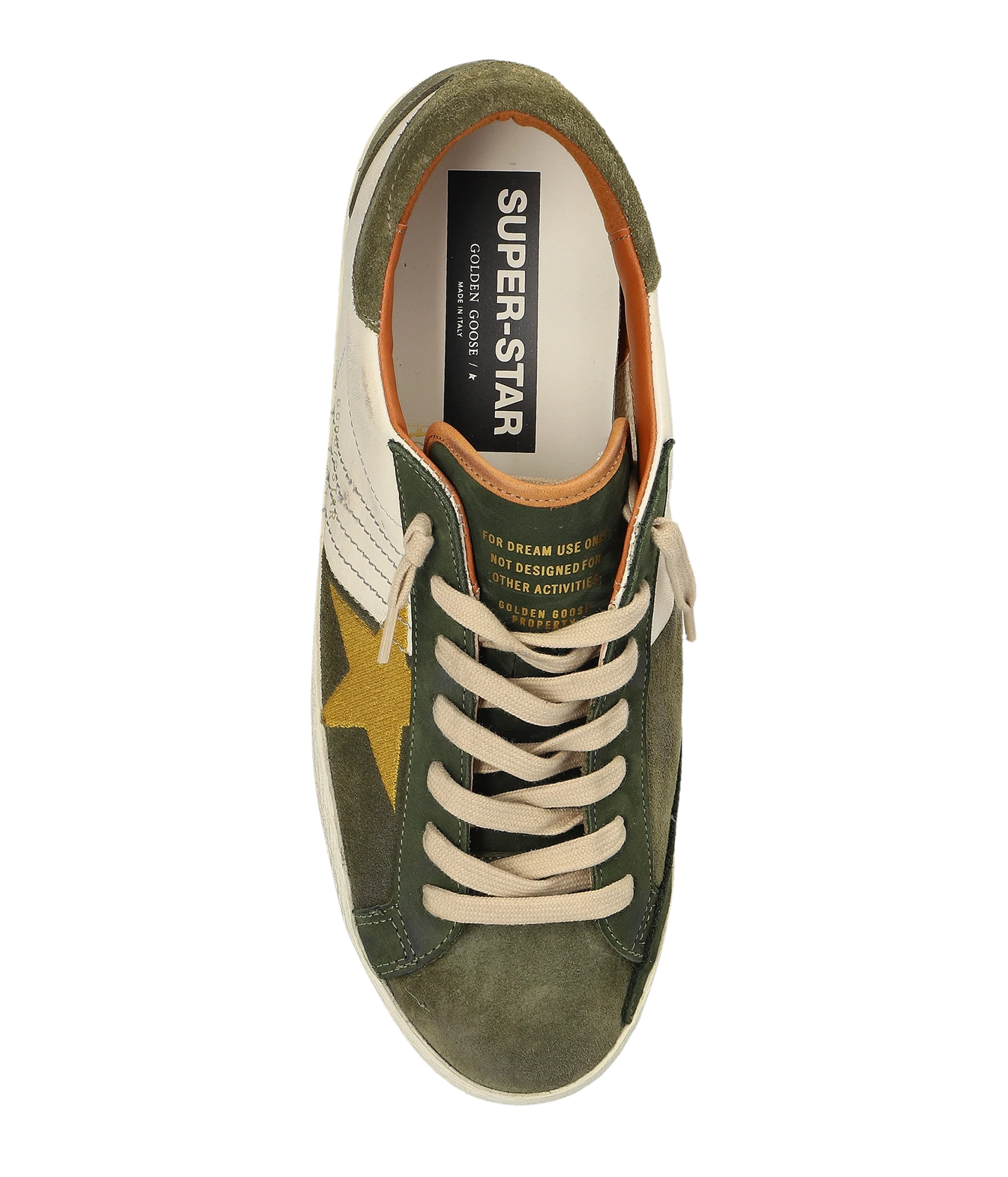 A top-down view of a Golden Goose Super-Star sneaker in olive green suede and cream canvas, featuring a gold star on the side, cream laces, and a black and white 'SUPER-STAR' label on the tongue.