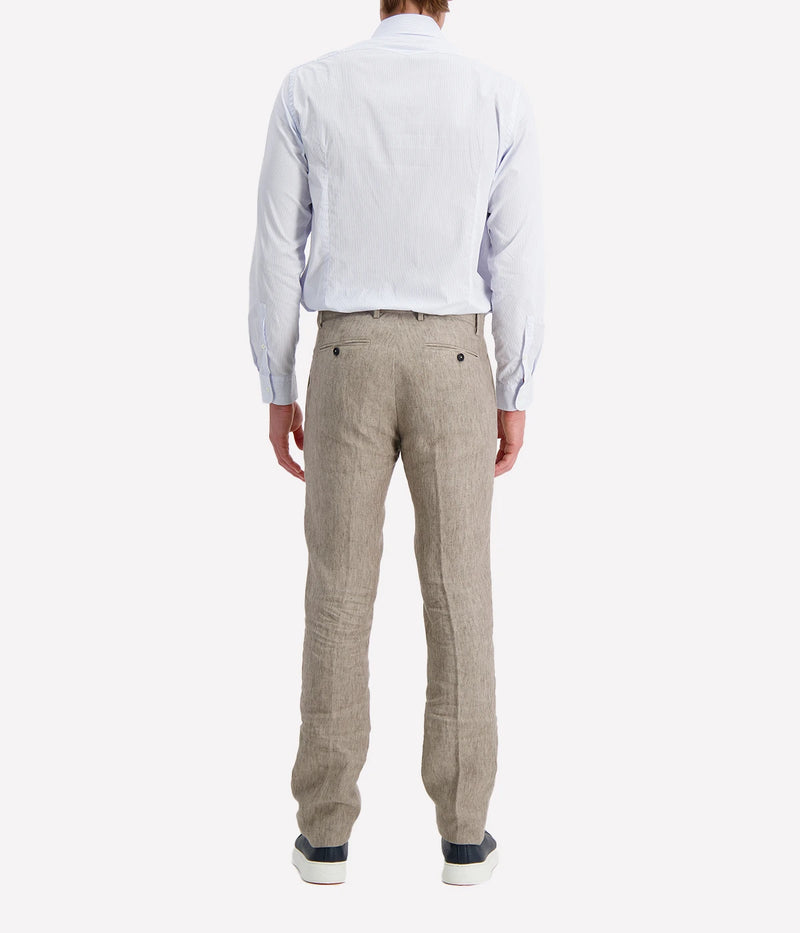 Regular-fit cotton shirt with a pointed collar, soft front placket, cotton voile inner bib, and custom badge embroidery. Made in Italy.