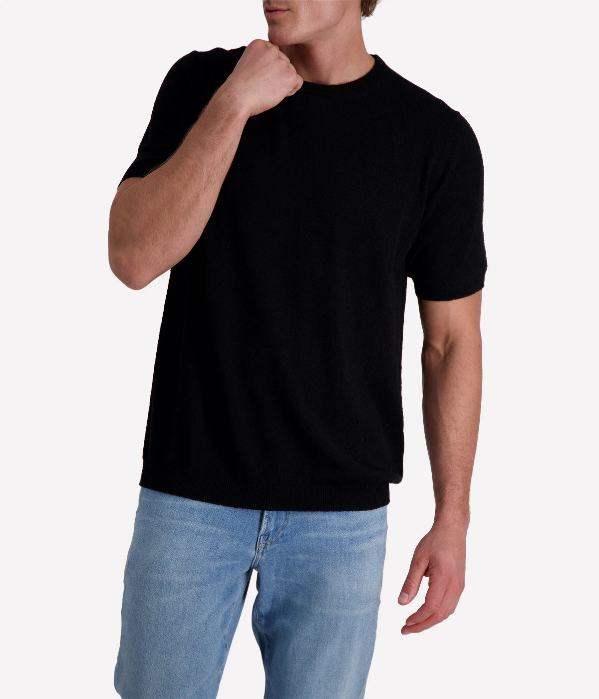 Black spongy-knit t-shirt crafted from a textured cotton blend, finished with ribbed details for a sleek and modern twist.