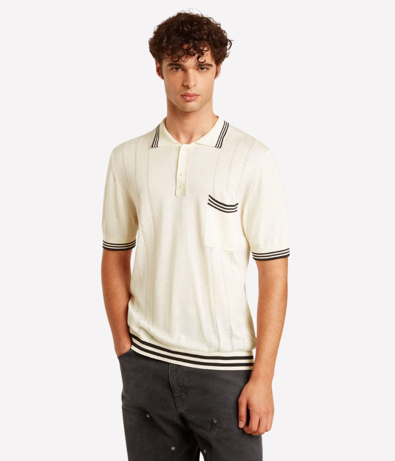 Golden Goose Journey Polo Shirt in worn white, crafted from soft knitted cotton-viscose with dark blue ribbing. Features a front pocket, mother-of-pearl buttons, and the signature double star on the back. Made in Italy.