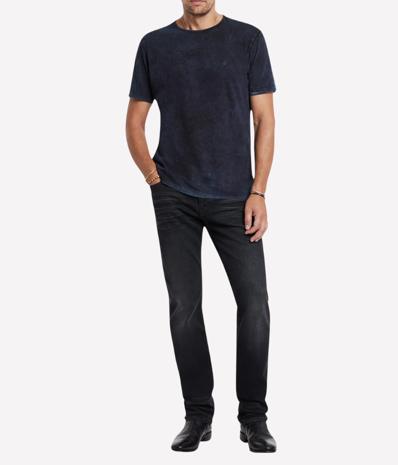 Model wearing the Gould short sleeve crew neck tee with casual denim, showcasing its versatile, lived-in look.