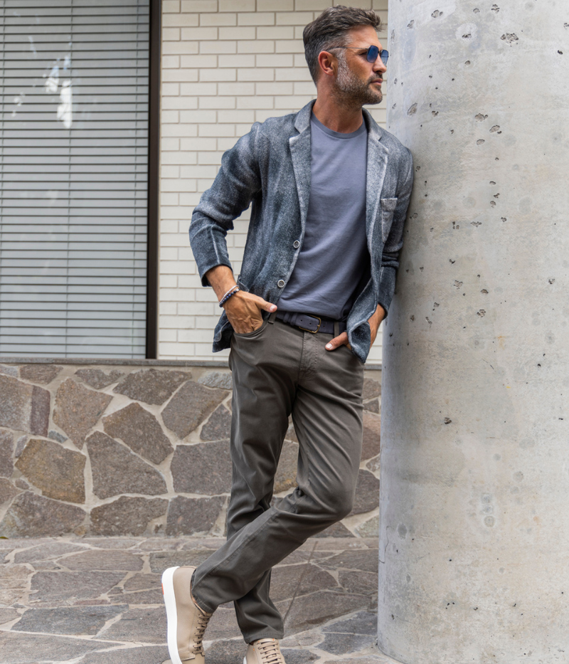 Men's knitted blazer by Avant Toi, crafted in Italy with a luxurious merino, virgin wool, and cashmere blend. Features a lapel collar, double single-breasted button closure, relaxed silhouette, and front pockets.