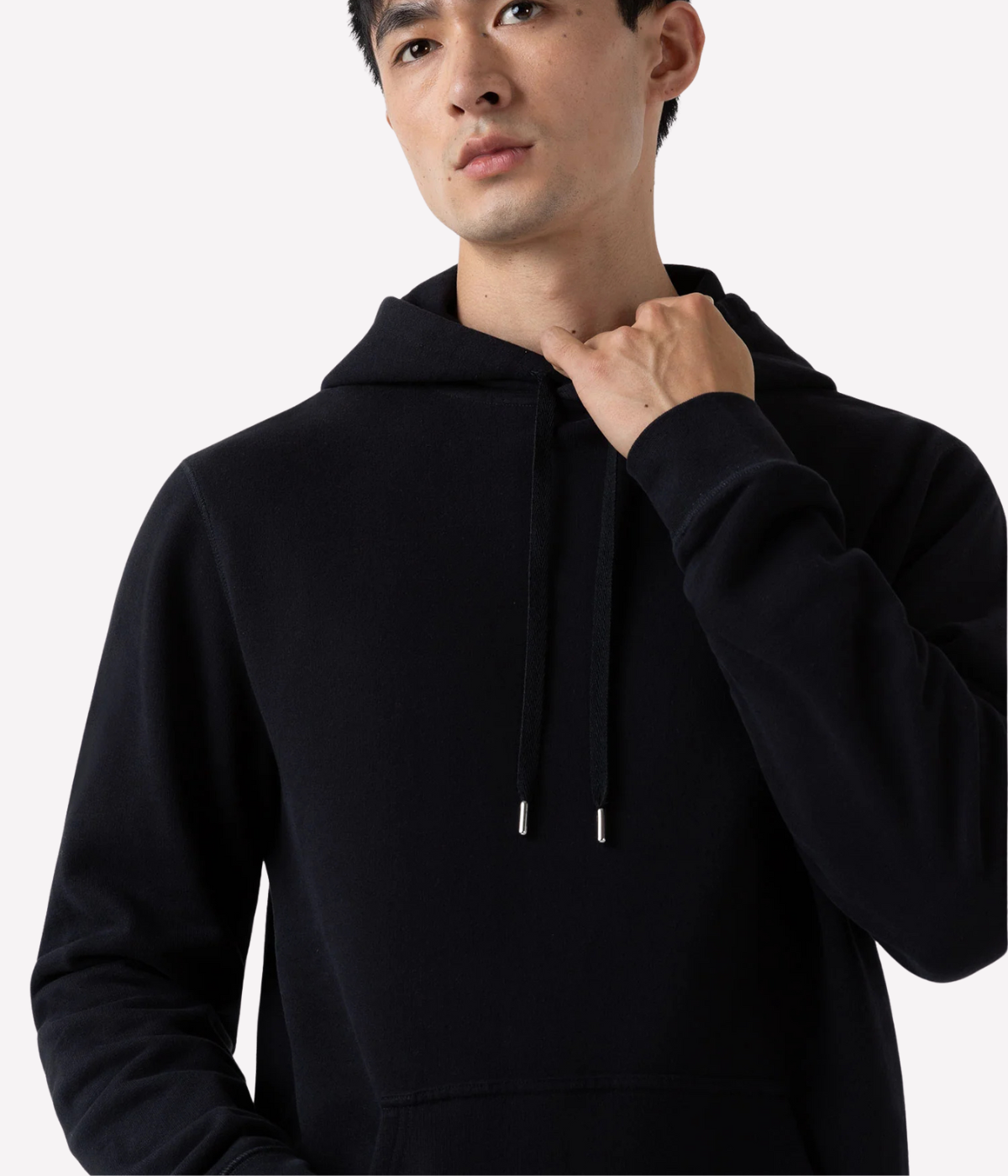 Men’s black loopback hoodie with double-layered hood, ribbed trims, and patch pocket—crafted from breathable cotton for year-round comfort.