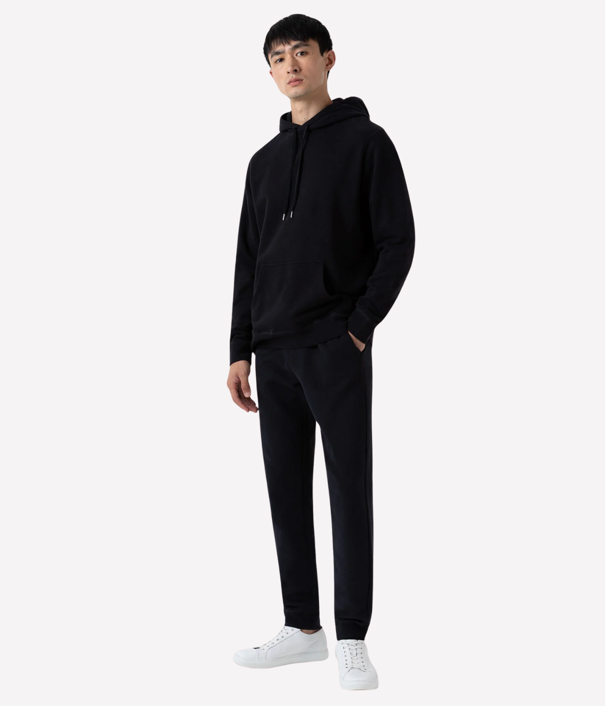 Men’s black loopback hoodie with double-layered hood, ribbed trims, and patch pocket—crafted from breathable cotton for year-round comfort.