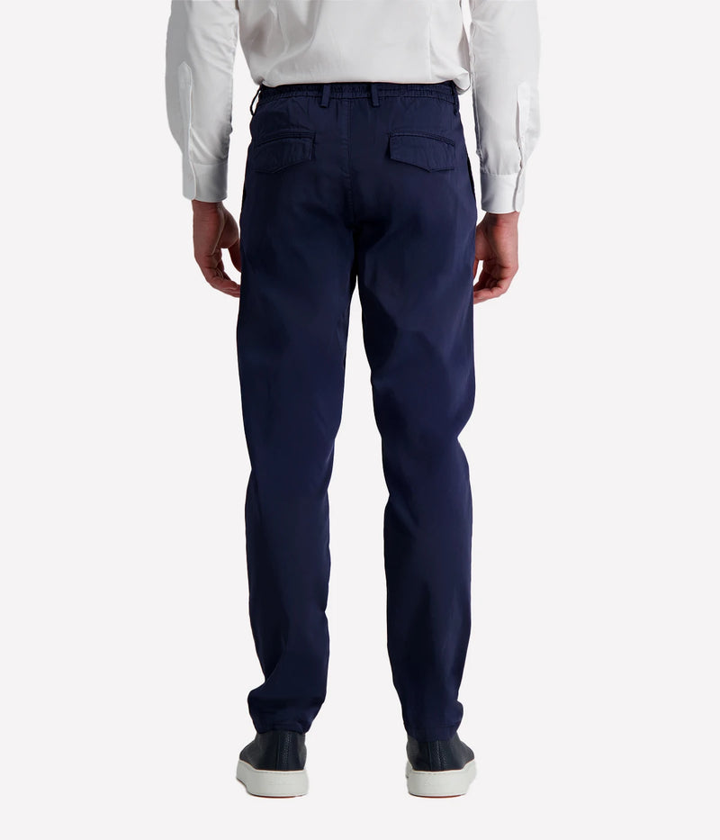 Eleventy tailored drawstring pants in navy jersey-effect cotton with subtle seam fading and sartorial detailing, made in Italy.