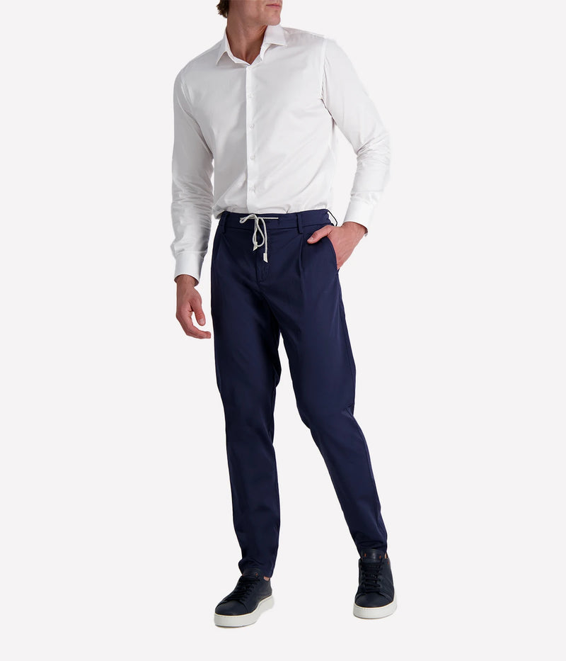 Eleventy tailored drawstring pants in navy jersey-effect cotton with subtle seam fading and sartorial detailing, made in Italy.
