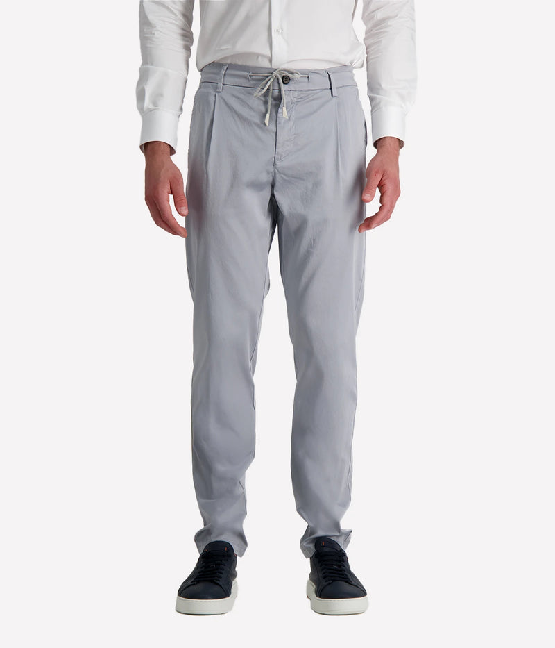 Eleventy tailored drawstring pants in jersey-effect cotton with subtle seam fading and sartorial detailing, made in Italy.