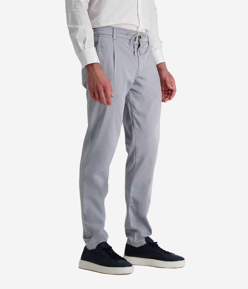 Eleventy tailored drawstring pants in jersey-effect cotton with subtle seam fading and sartorial detailing, made in Italy.