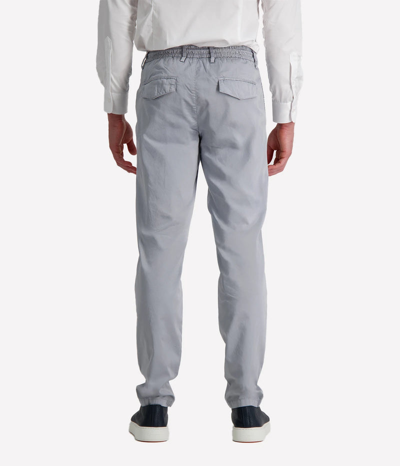 Eleventy tailored drawstring pants in jersey-effect cotton with subtle seam fading and sartorial detailing, made in Italy.