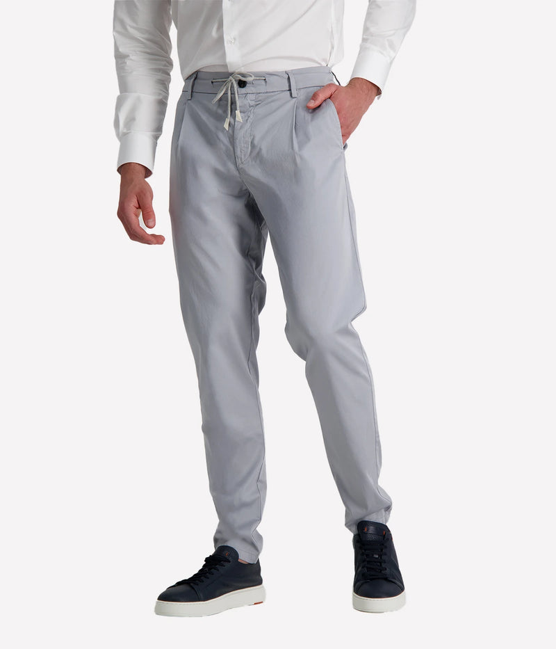 Eleventy tailored drawstring pants in jersey-effect cotton with subtle seam fading and sartorial detailing, made in Italy.