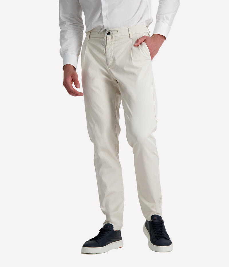 Eleventy tailored drawstring pants in sand jersey-effect cotton with subtle seam fading and sartorial detailing, made in Italy.