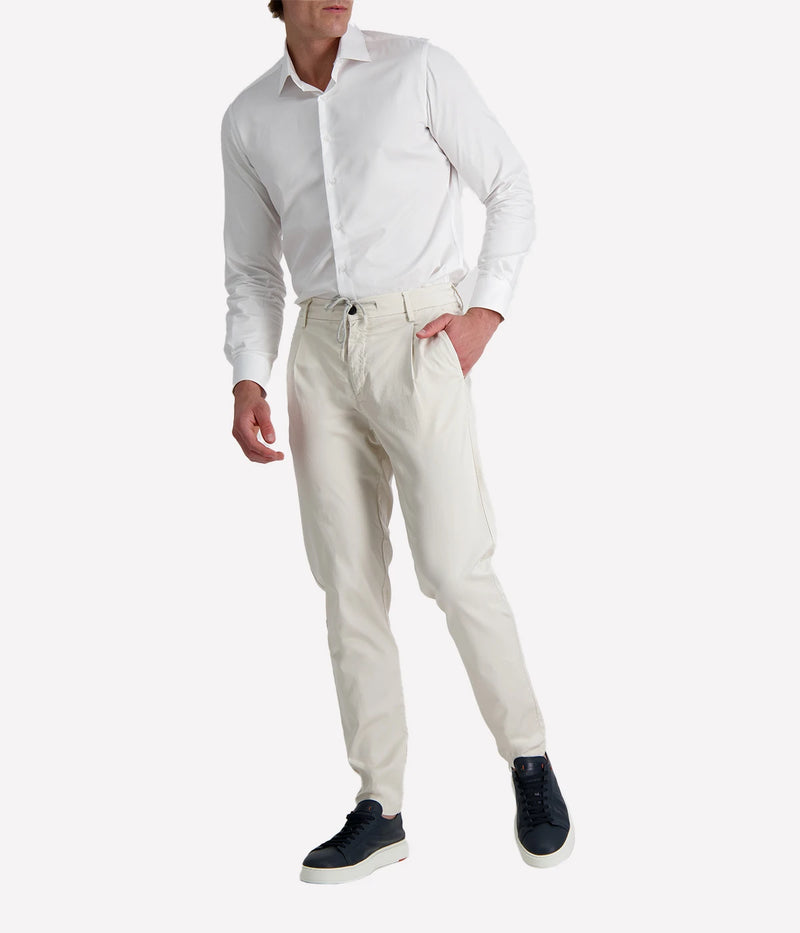 Eleventy tailored drawstring pants in sand jersey-effect cotton with subtle seam fading and sartorial detailing, made in Italy.