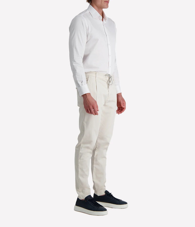 Eleventy tailored drawstring pants in sand jersey-effect cotton with subtle seam fading and sartorial detailing, made in Italy.
