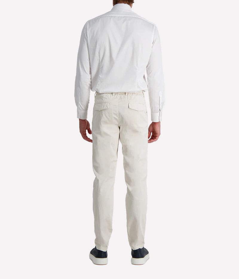 Eleventy tailored drawstring pants in sand jersey-effect cotton with subtle seam fading and sartorial detailing, made in Italy.