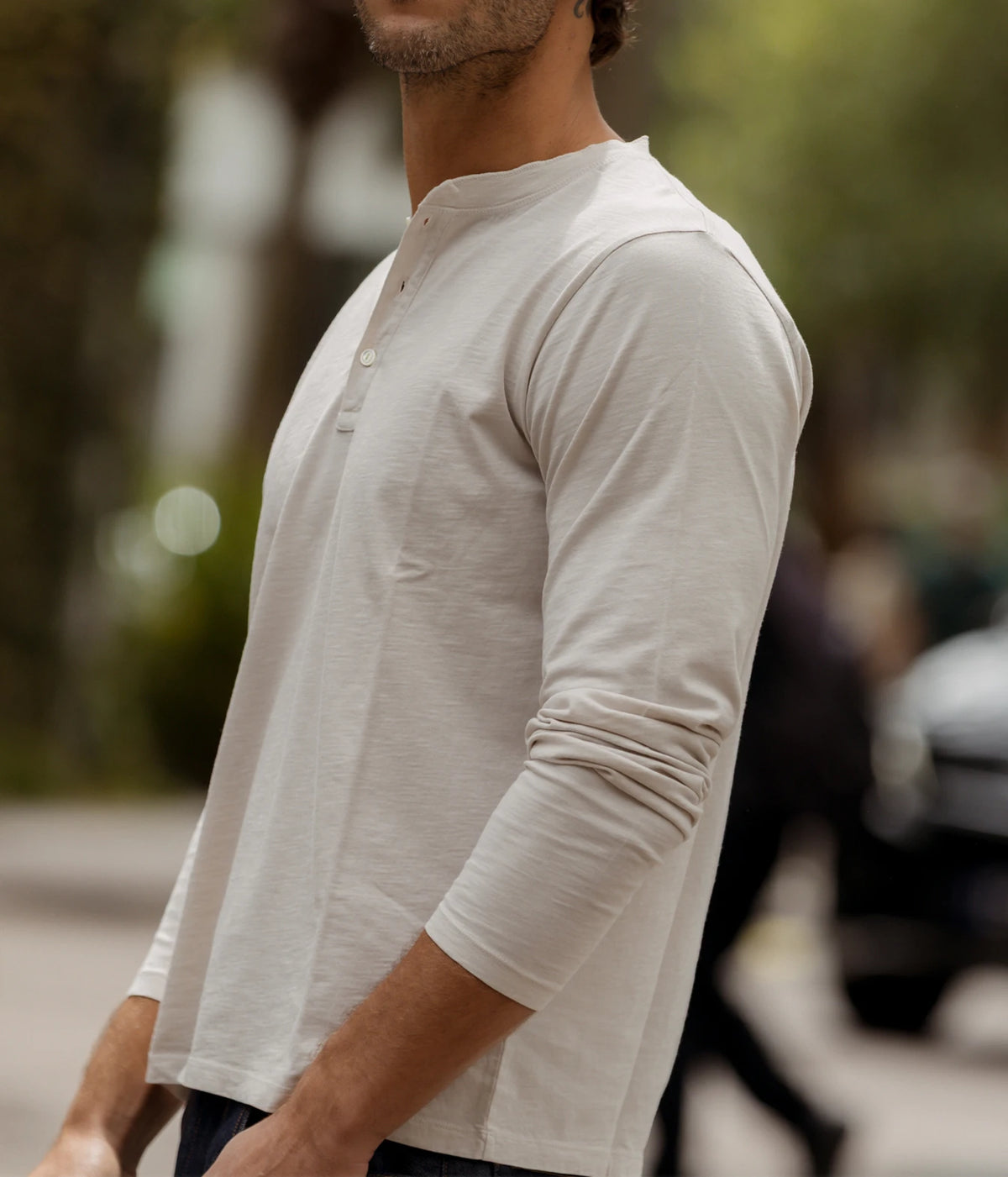 Close-up of Hartford Henley Long-Sleeve T-Shirt in Stone on model outdoors, front view