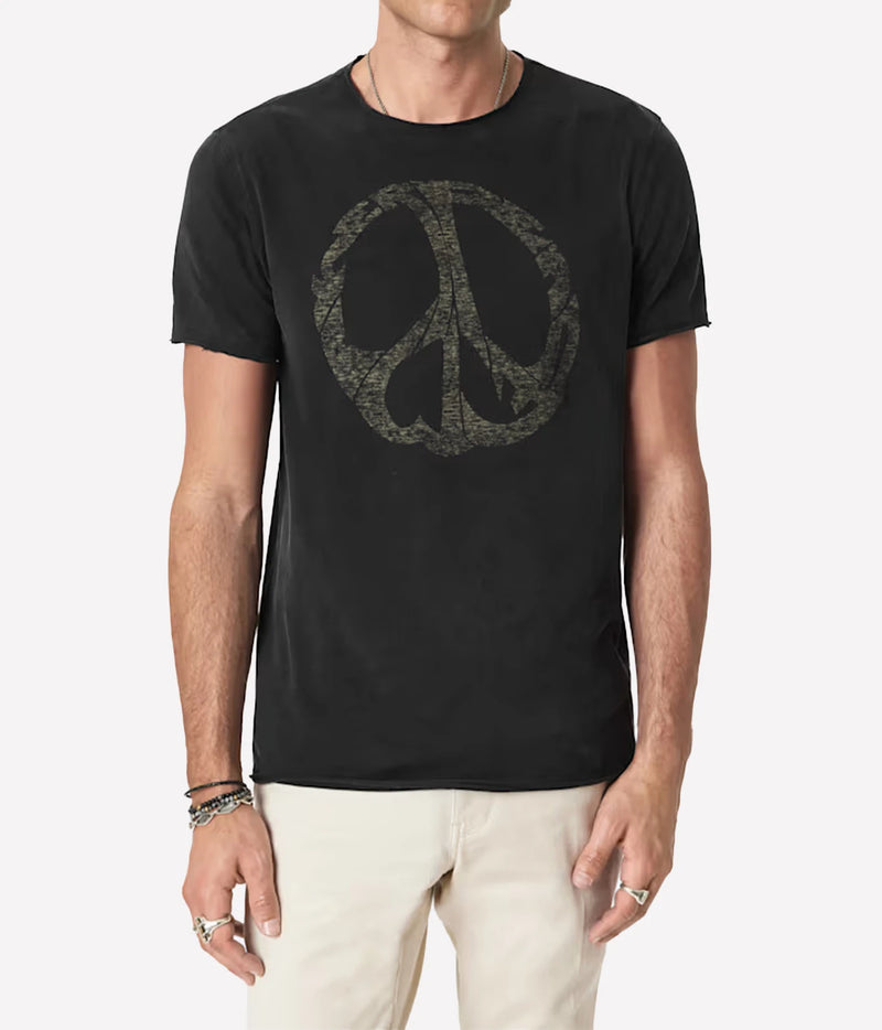 Man wearing John Varvatos Peace Maker Raw Edge Tee in Black with off-white trousers, front view