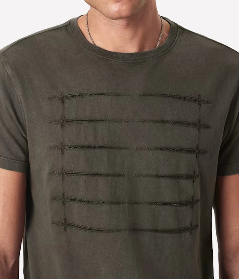 Close-up of John Varvatos Sword Piping Embroidered Tee in Teakwood on model showing the dagger artwork