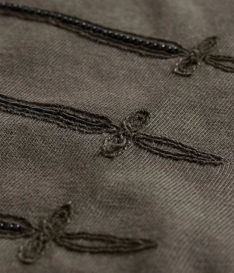 Close-up of John Varvatos Sword Piping Embroidered Tee in Teakwood showing the bullion embroidery and beadwork