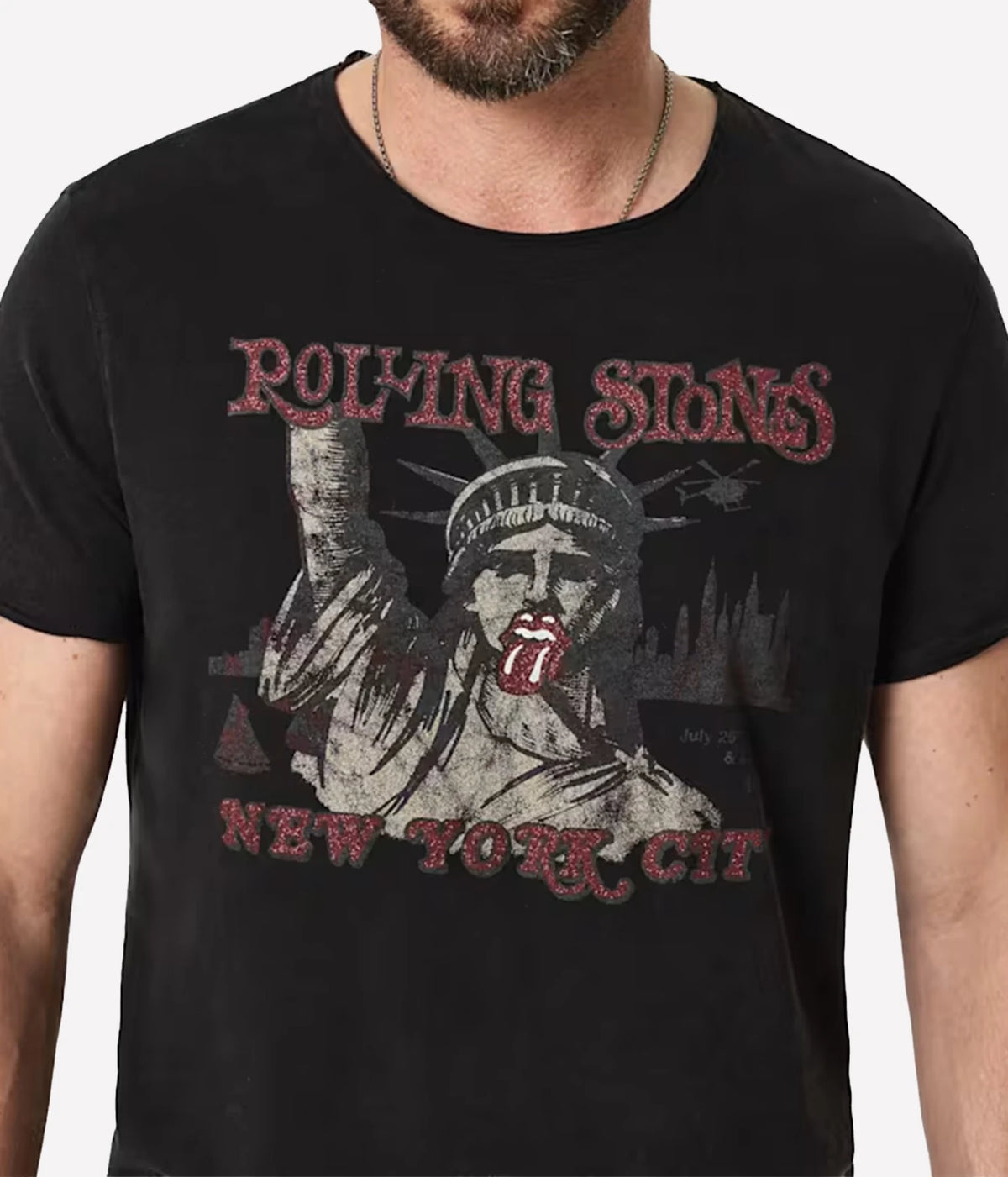 Close-up of John Varvatos The Rolling Stones NYC Raw Edge Tee in Black on model showing the tongue logo and Statue of Liberty graphic