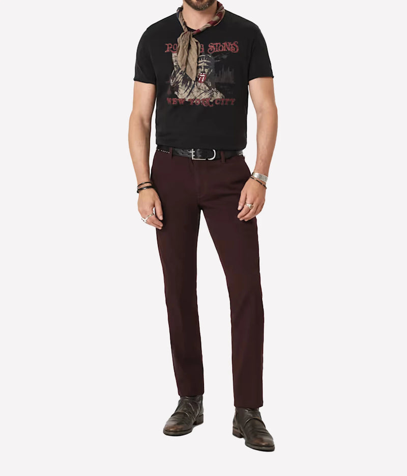 Man wearing John Varvatos The Rolling Stones NYC Raw Edge Tee in Black with burgundy trousers, full-length front view