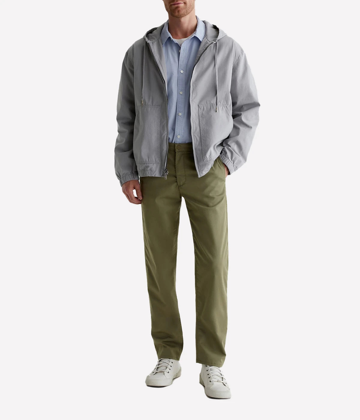 AG's Kullen slim-fit trousers in lightweight 5.9 oz. Airluxe™ Commuter Performance Sateen, featuring a refined texture and powerful stretch for comfort and shape retention. Designed with a 10 1/4" front rise, 17" knee opening, 14" bottom opening, and 32" inseam.