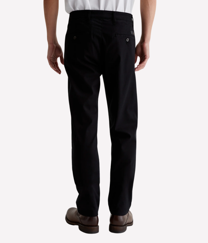 A versatile slim-fit trouser designed for modern men who appreciate style and comfort. Crafted from premium Sorrento Stretch Twill, these black trousers offer a tailored look with flexibility, making them perfect for both casual and elevated occasions.