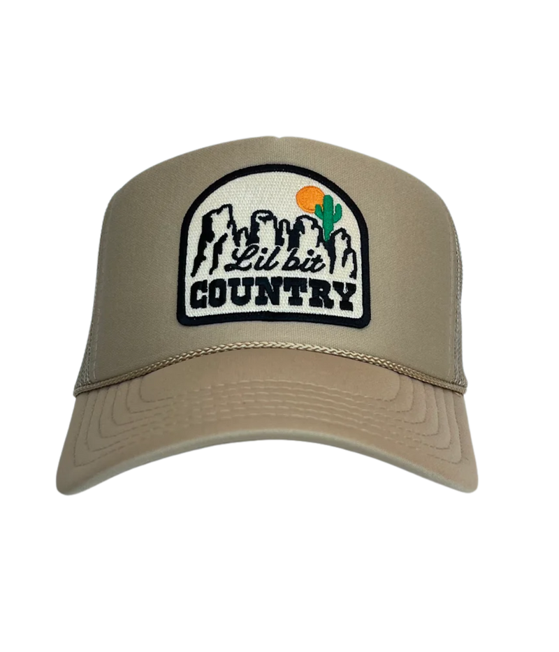 Port Sandz ‘Lil’ Bit Country’ high-profile trucker cap with foam front, mesh back, snapback closure, fully embroidered patch, playful western and country-inspired style