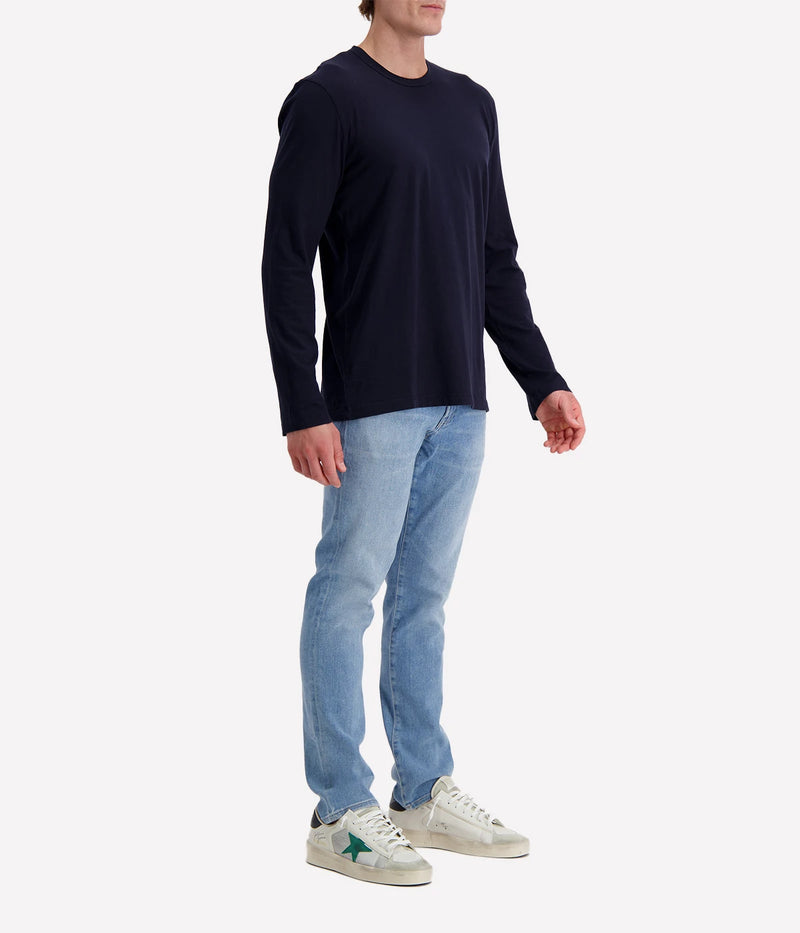 Long-sleeve crew neck shirt in ultra-soft 100% cotton, garment-dyed for a relaxed, lived-in feel. Classic fit with clean-finished hems, perfect for layering or wearing solo.