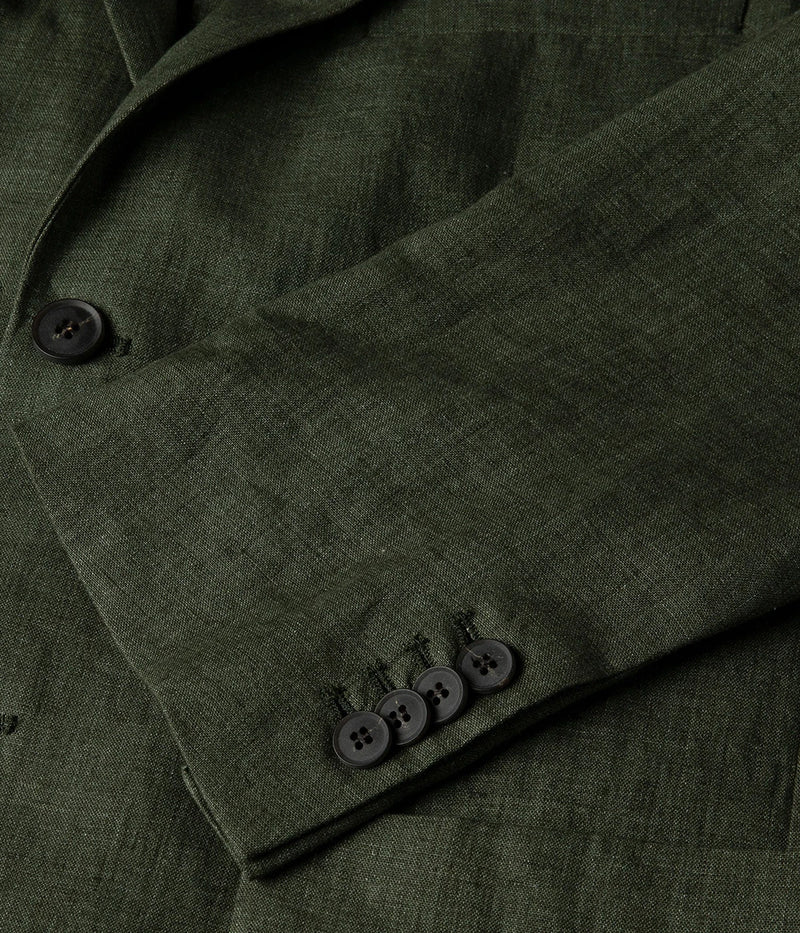 Men’s hunter green unstructured linen blazer with two-button closure, side pockets, and darted tailoring—crafted from lightweight Italian linen for summer sophistication.
