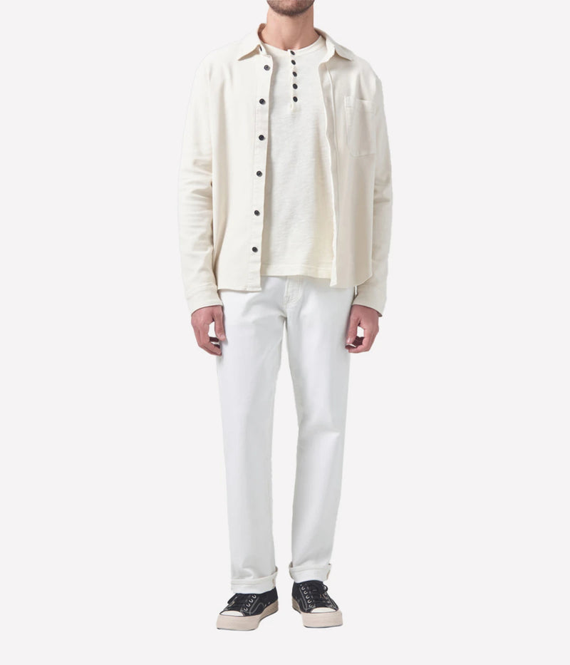 Citizens of Humanity London jeans in a crisp white wash, featuring a slim, tapered fit with a comfortable feel through the hip and thigh. Crafted from a soft organic cotton blend for a sleek yet flexible finish.