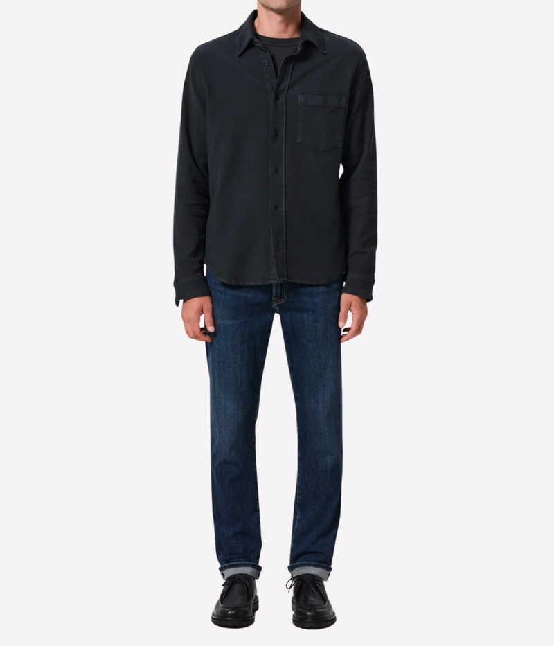 Citizens of Humanity London Jean in darker medium indigo—slim tapered fit with subtle fading, whiskering, and soft stretch midweight denim.