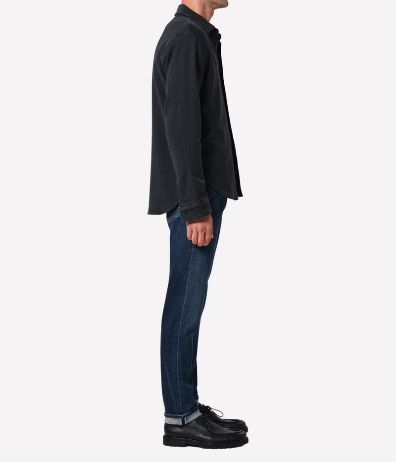 Citizens of Humanity London Jean in darker medium indigo—slim tapered fit with subtle fading, whiskering, and soft stretch midweight denim.