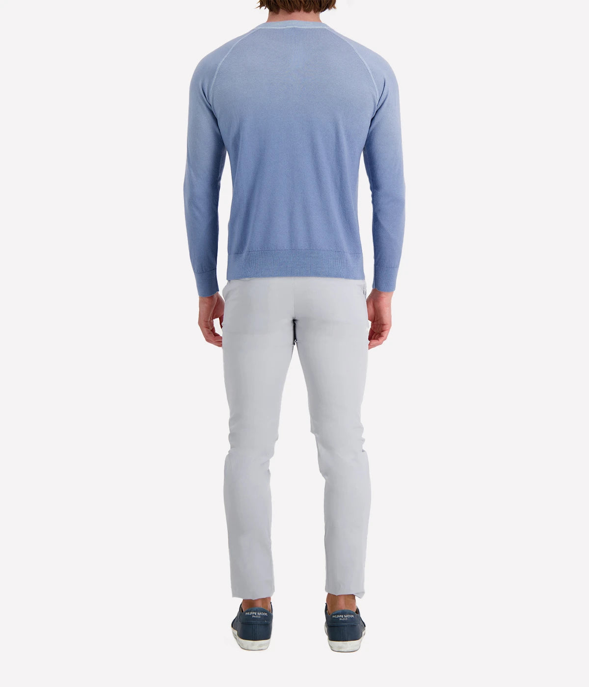 Back view of the Eleventy sky blue crew neck sweater, showcasing a seamless finish and lightweight knit fabric.