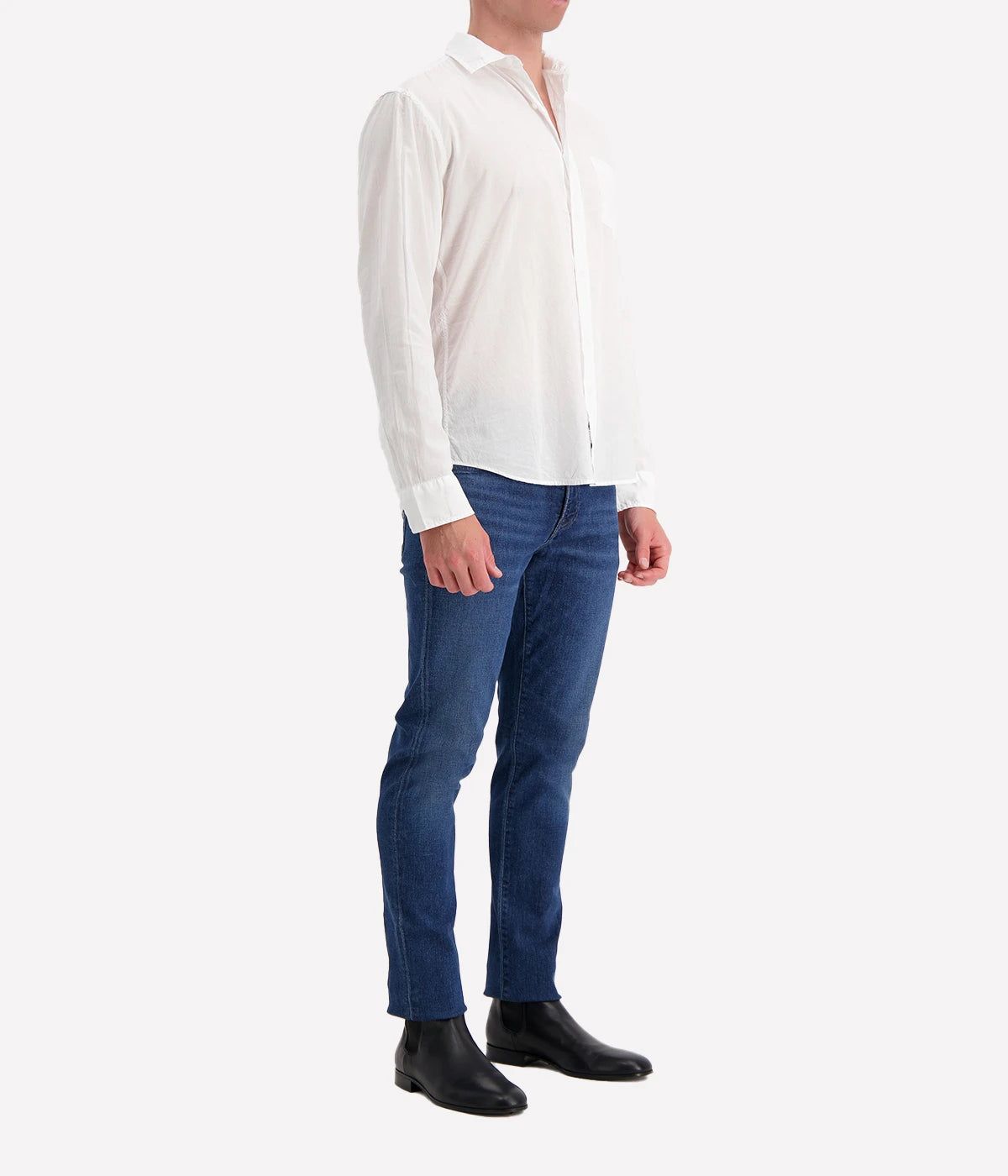 A side view of the Luke Woven Button Down Shirt, highlighting its structured silhouette and clean lines along the sleeves and hem.