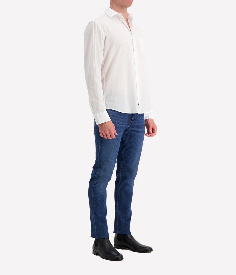 A side view of the Luke Woven Button Down Shirt, highlighting its structured silhouette and clean lines along the sleeves and hem.