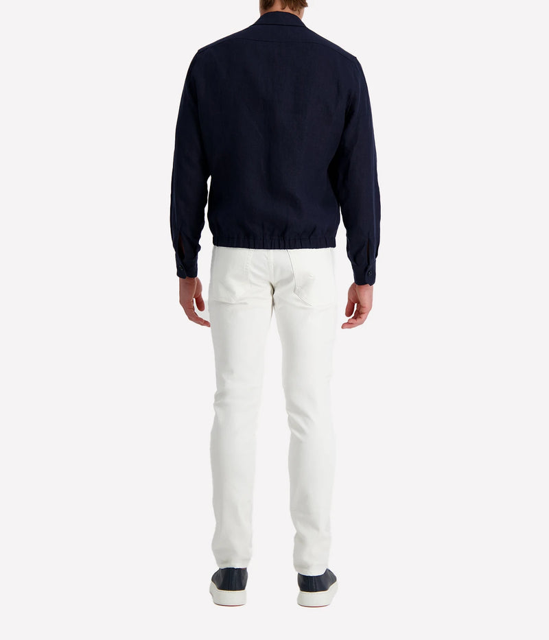 Lardini ‘Attitude’ jacket in dark navy linen blend with button front, flap chest pockets, and elasticated hem, styled over a white tee and white trousers.