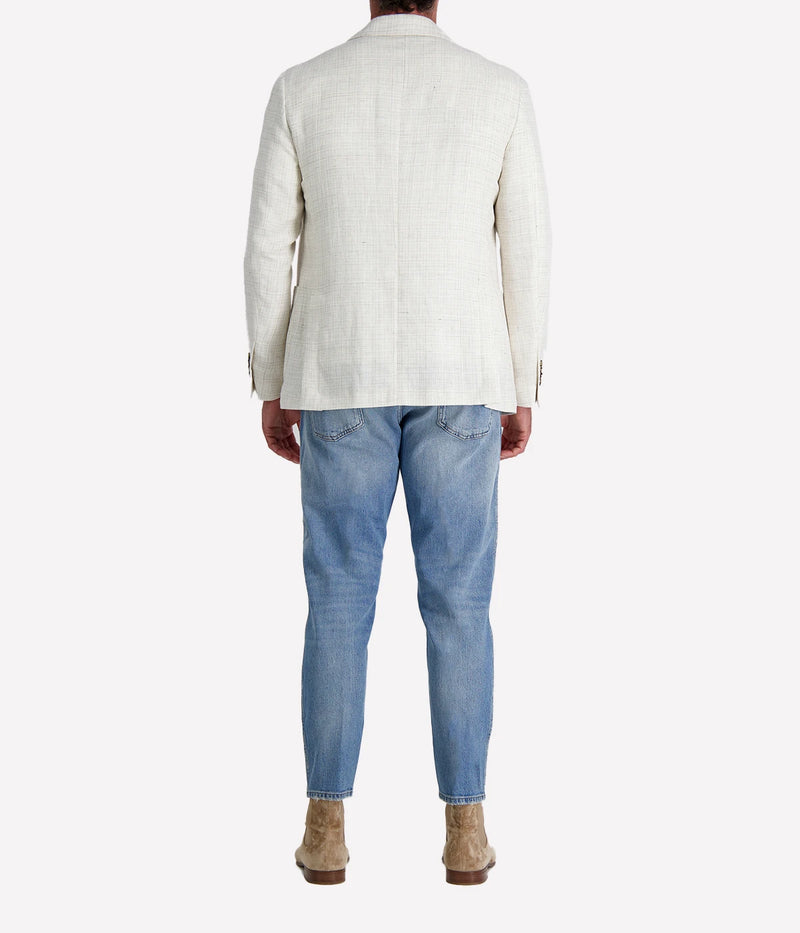 A white/cream Lardini jacket crafted from a blend of 60% linen and 40% virgin wool. The single-breasted design features a classic lapel and is finished with the signature Lardini boutonnière. Tailored fit for a sharp, refined silhouette.