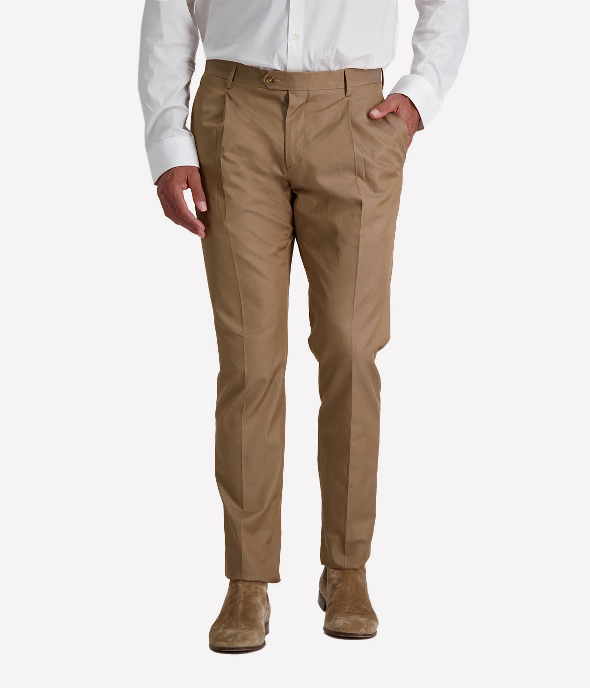 Model wearing a light brown Lardini cotton suit with a white shirt and suede loafers, featuring a single-breasted blazer with Lardini’s signature boutonnière, styled outdoors in a relaxed, modern setting.