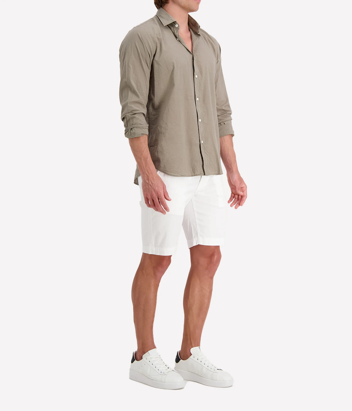 Side view of the Hartford Sammy Shirt, showing its slim fit and buttoned cuffs. The cotton voile fabric drapes softly for an effortlessly refined look.
