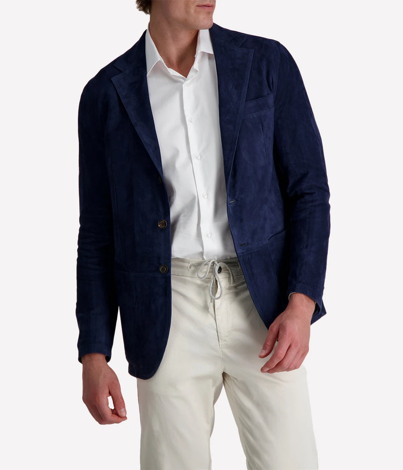 Eleventy navy blue leather blazer featuring a slim, tailored fit and notch lapels. Crafted from soft leather for a refined look.