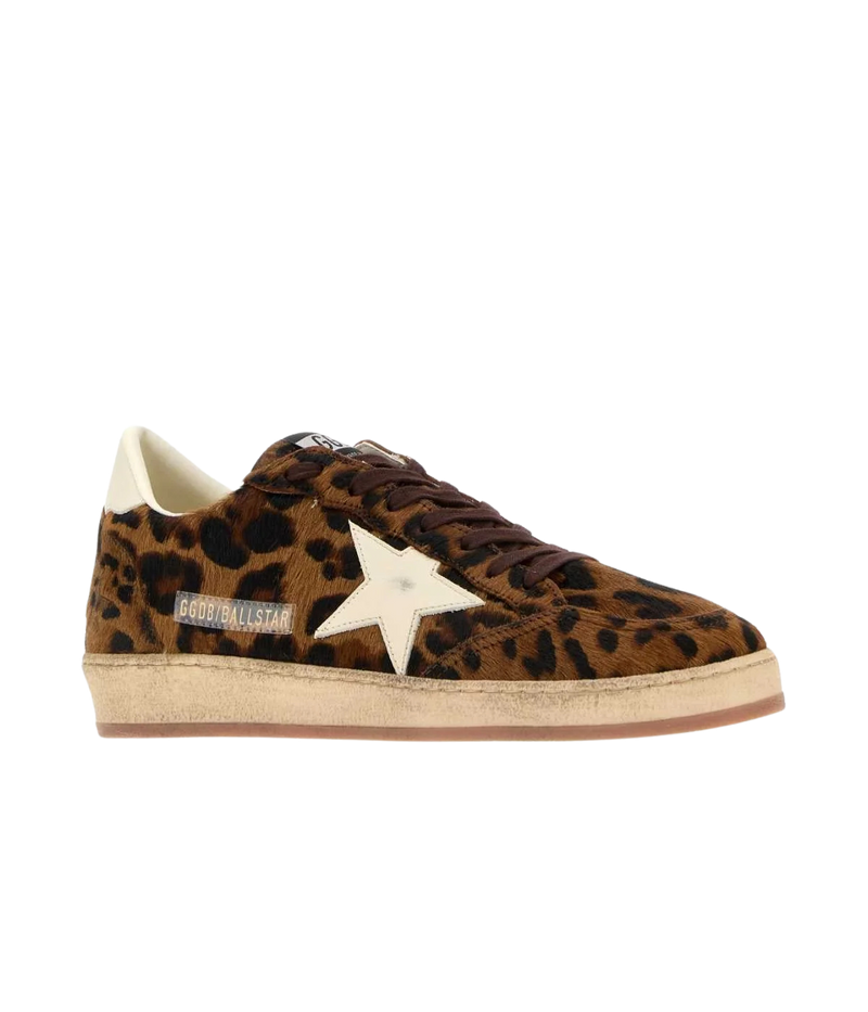 Golden Goose Ball Star low-top sneakers with leopard-print horsy leather upper and cream leather star, angled side profile.