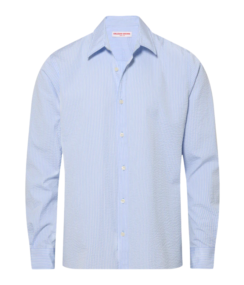 Orlebar Brown Justin Seersucker Stripe Shirt in Surfside Blue & Thasos Beach front flat lay.
